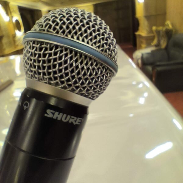 Handheld microphone used with the hall's sound system